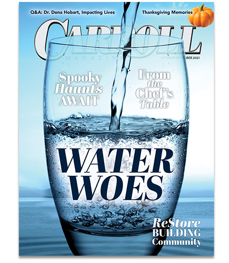 Magazine cover with water pouring into a glass titled Water Woes.