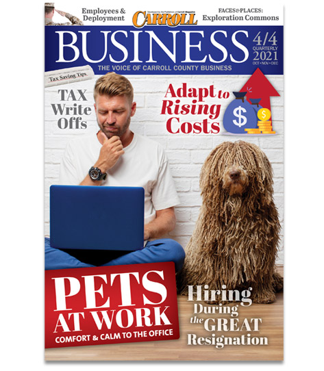 Man using laptop next to a shaggy dog on a business magazine cover.