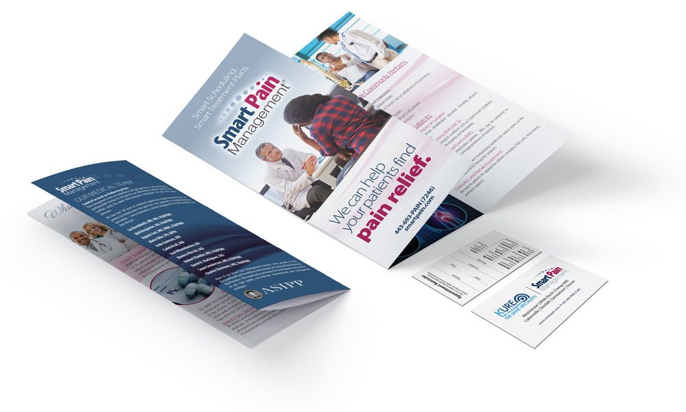 A stack of various printed materials, including brochures, business cards, and postcards, ready for distribution.